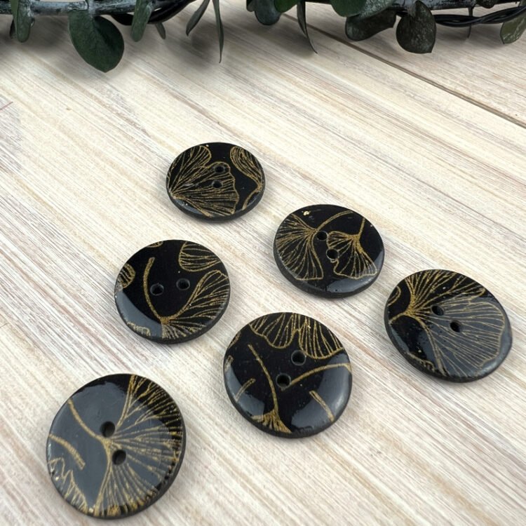 Boutons pour tricot Impression Ginko noir or